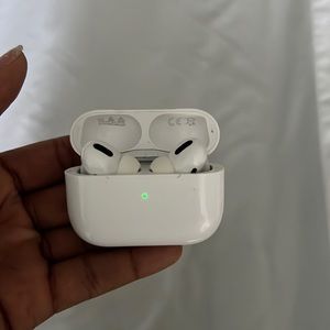 AirPods Pro with case and free cover case.